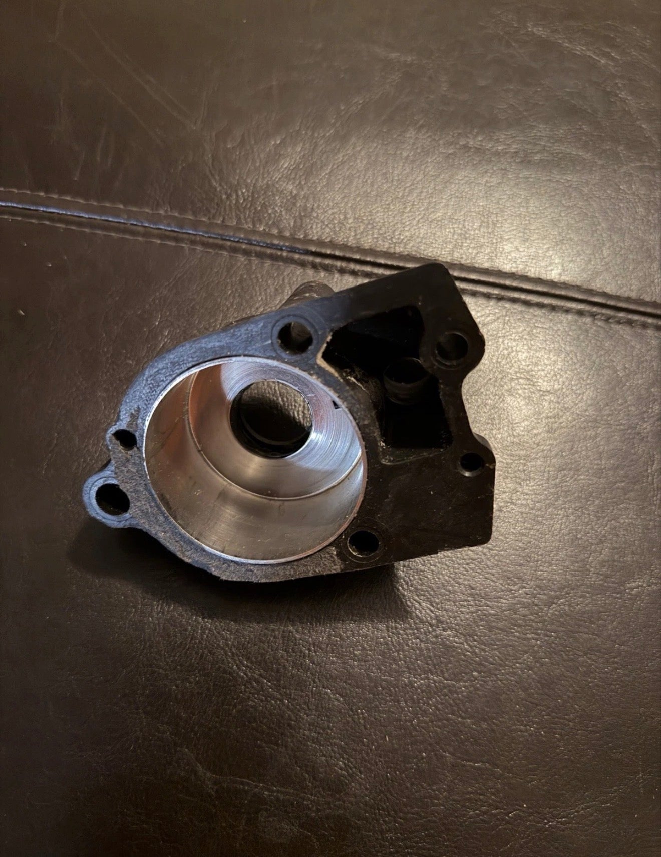 NEW-Upper water pump housing for a Mercury or Mariner outboard engine