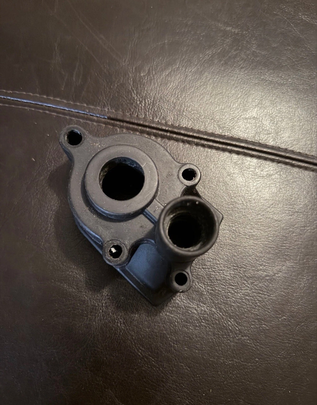 NEW-Upper water pump housing for a Mercury or Mariner outboard engine