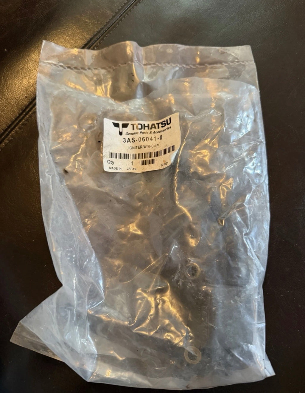 Genuine Tohatsu Outboard Igniter (Ignition Coil) assembly.