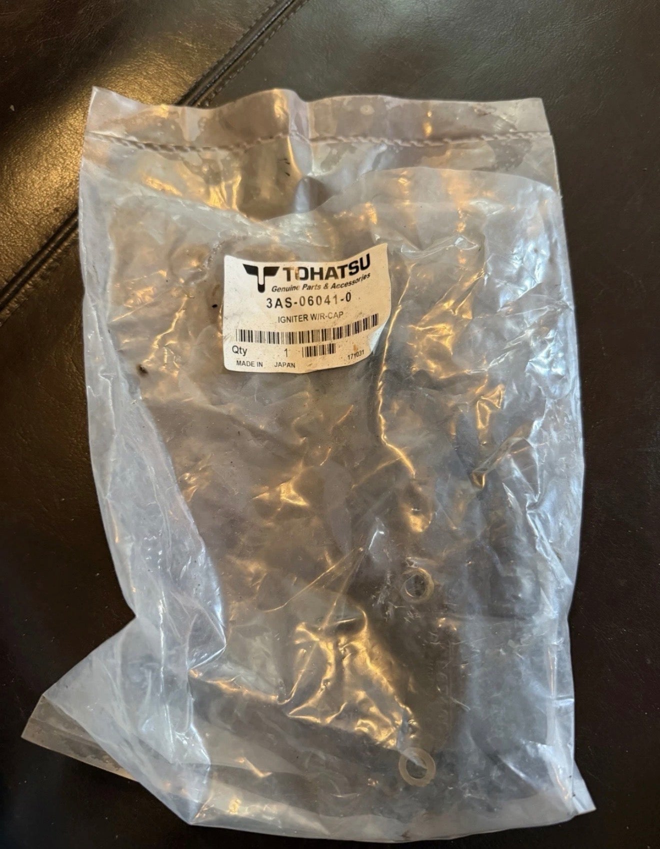 Genuine Tohatsu Outboard Igniter (Ignition Coil) assembly.